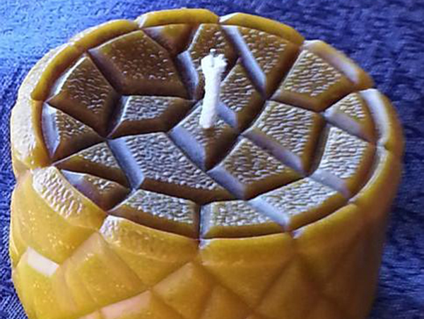 A beeswax candle A beeswax candle