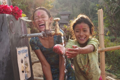 Children in Tosramkhola celebrate having access to clean water in their community Children in Tosramkhola celebrate having access to clean water in their community
